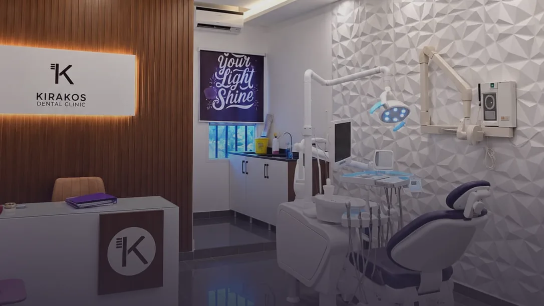 Wide view of the Zouk Mosbeh clinic reception, warm evening light, with a dark uncluttered lower area behind the headline text.
